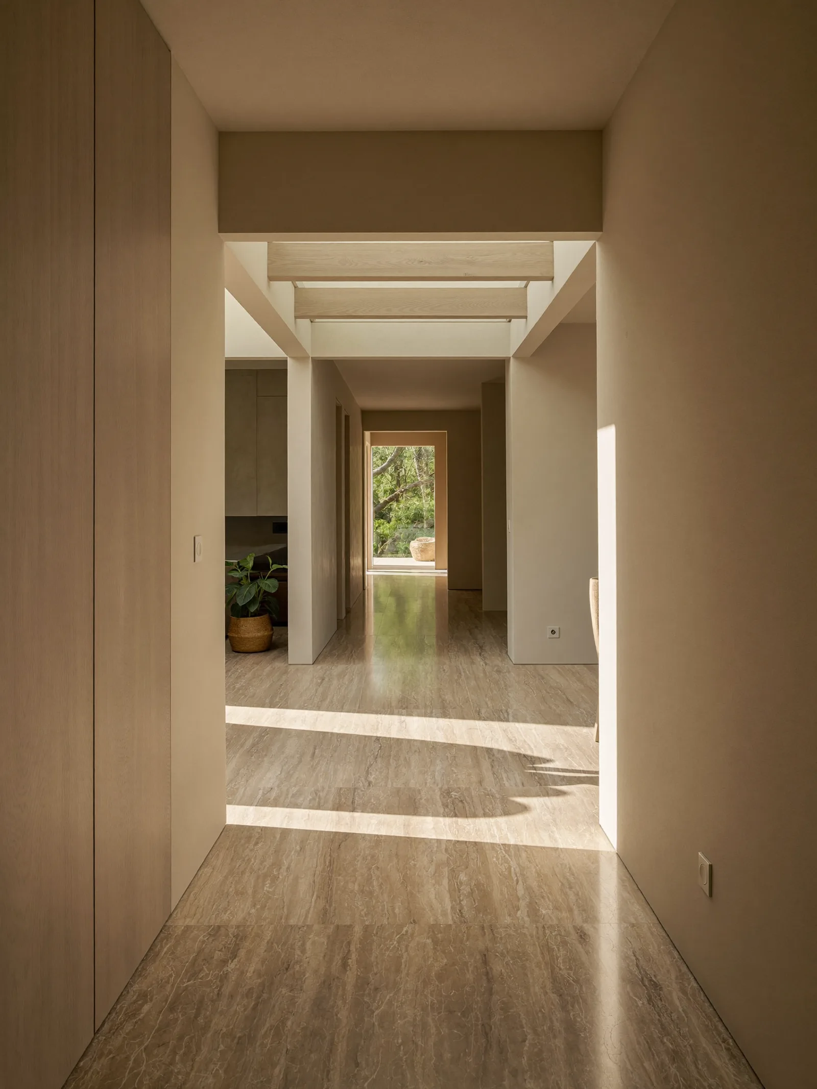 A calm, sunlit residence interior, the antidote to a noisy market