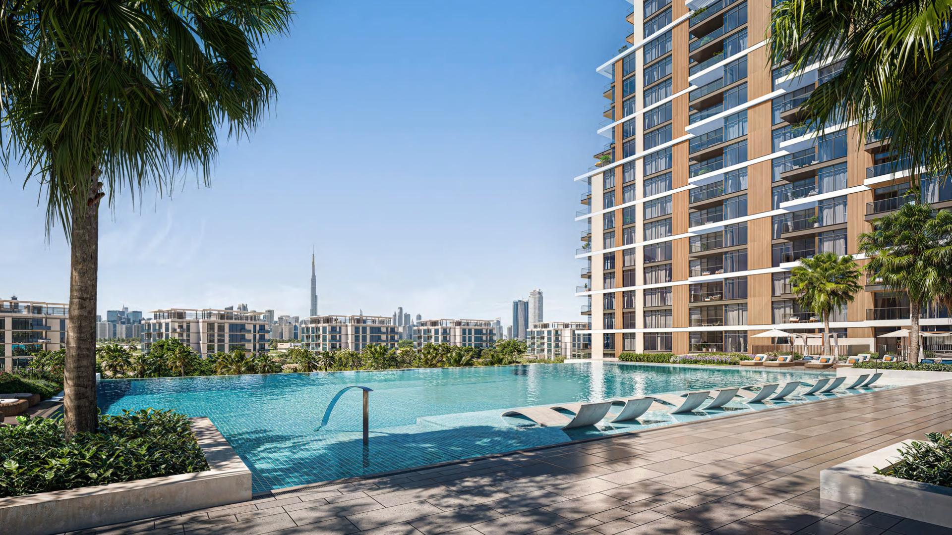 Pool deck at District One with the Burj Khalifa beyond.