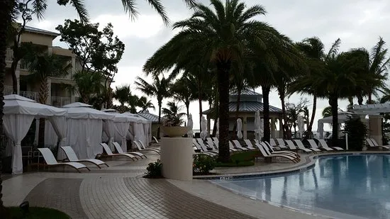 Lounges & Cabanas at Flora Isle Beachfront Residences.